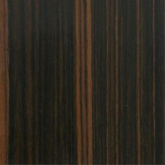 Dark ebony wood veneer with reddish-brown striations, displaying a linear grain pattern and glossy finish for furniture applications.